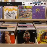 Explore vintage soul records displayed at a Tulsa record store, featuring iconic album covers.